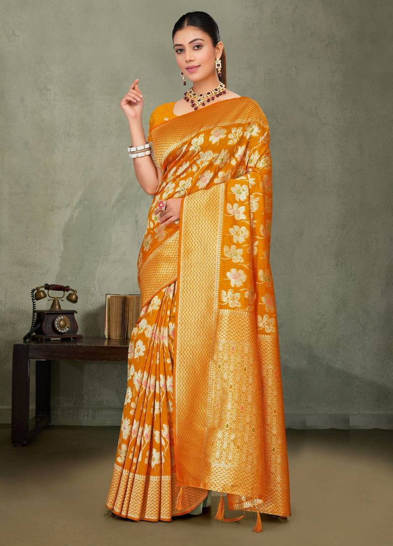Mustard yellow silk saree with floral zari and thread work