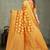 Mustard yellow silk saree with floral zari and thread work