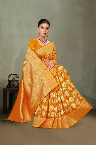 Mustard yellow silk saree with floral zari and thread work
