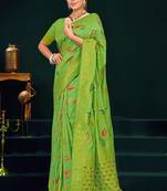 Light green dola silk saree with multicolor floral zari and thread work