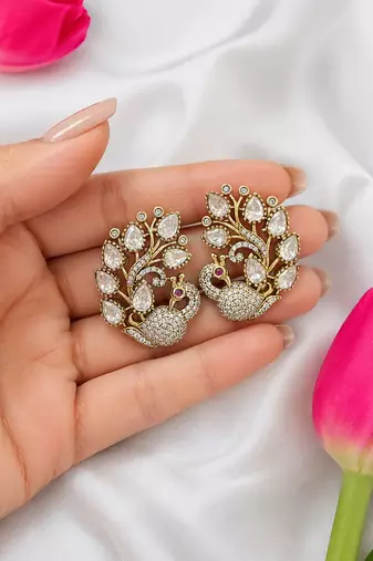 Antique gold-plated peacock design kundan & cz stud earrings for women