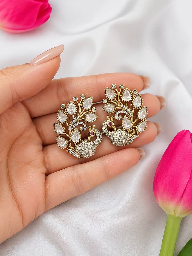 Antique gold-plated peacock design kundan & cz stud earrings for women