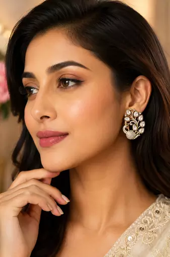 Antique gold-plated peacock design kundan & cz stud earrings for women