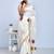 White kerala hand embroidered shimul flower design cotton saree