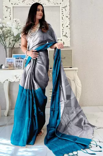 Teal woven design tissue sarees