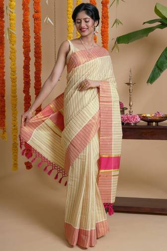 cream teejh striped zari tissue kasavu saree