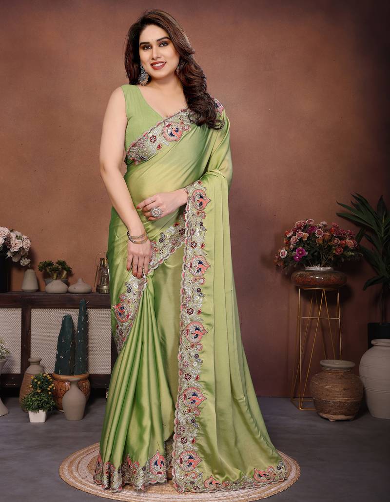 green color rangoli silk embroidery work saree with plain  blouse piece