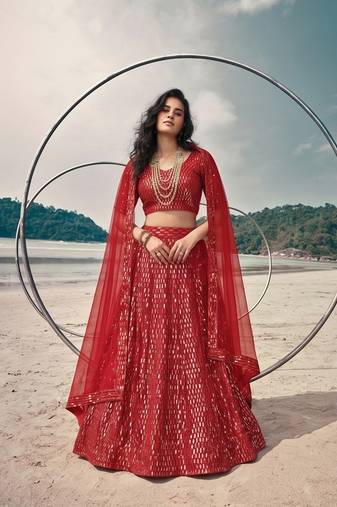 Red net lehenga with un-stitched blouse