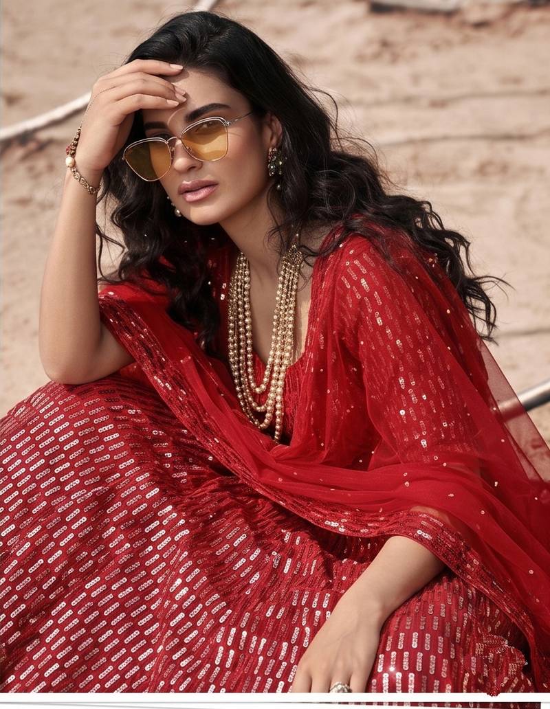 Red net lehenga with un-stitched blouse