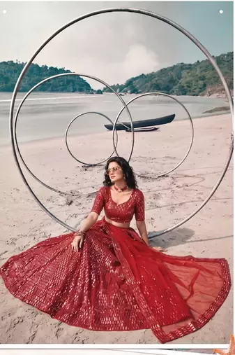 Red net lehenga with un-stitched blouse