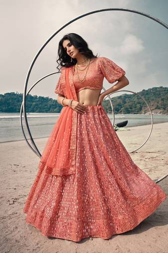 Red net lehenga with un-stitched blouse party wedding wear