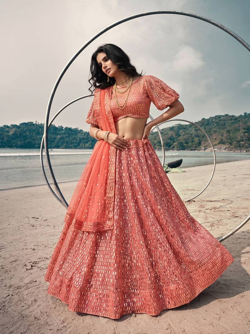 Red net lehenga with un-stitched blouse party wedding wear