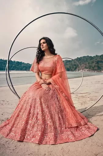 Red net lehenga with un-stitched blouse party wedding wear