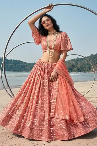 Red net lehenga with un-stitched blouse party wedding wear