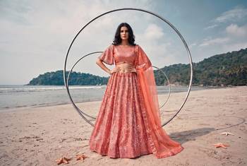 Red net lehenga with un-stitched blouse party wedding wear 4