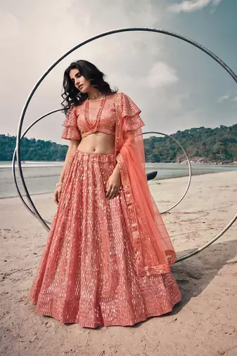 Red net lehenga with un-stitched blouse party wedding wear