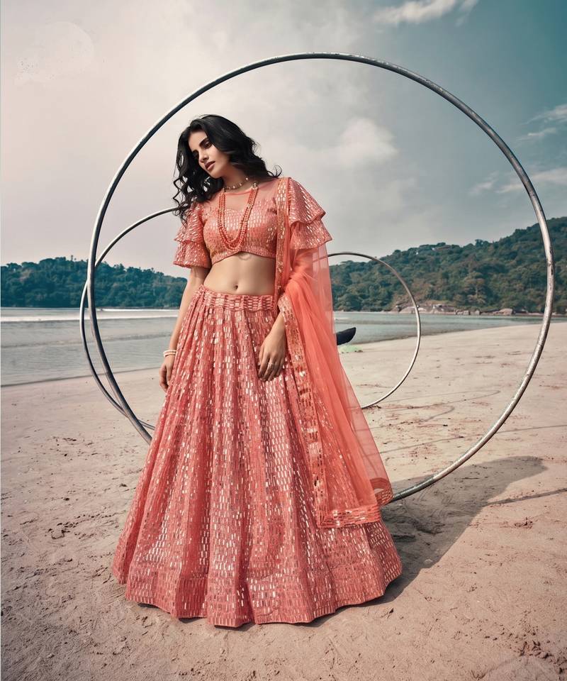 Red net lehenga with un-stitched blouse party wedding wear