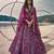 Purple net lehenga with un-stitched blouse party wedding wear