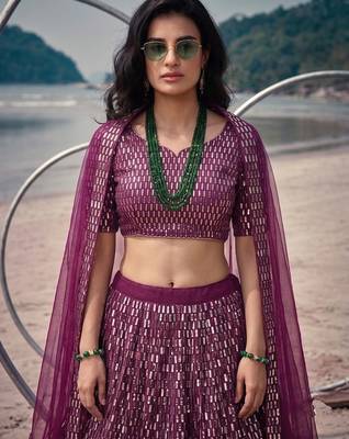 Purple net lehenga with un-stitched blouse party wedding wear 3