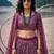 Purple net lehenga with un-stitched blouse party wedding wear
