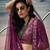 Purple net lehenga with un-stitched blouse party wedding wear