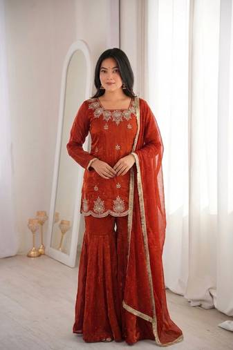 Orange fendy silk embroidered sharara suit with zarkan diamond work