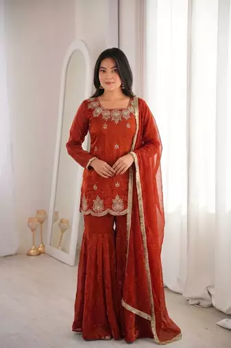 Orange fendy silk embroidered sharara suit with zarkan diamond work
