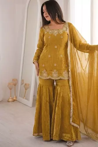 Yellow fendy silk embroidered sharara suit with zarkan diamond work