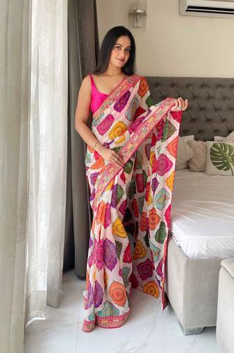 Multicolor rajwadi bandhej print georgette saree with embroidered lace border