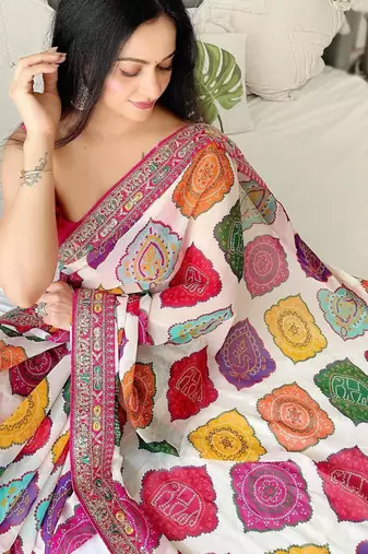Multicolor rajwadi bandhej print georgette saree with embroidered lace border