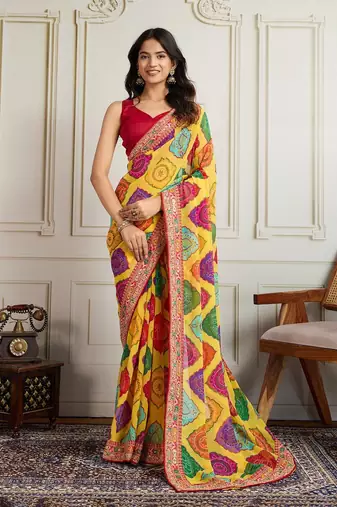 Yellow rajwadi bandhej print georgette saree with embroidered lace border