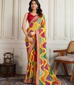 Yellow rajwadi bandhej print georgette saree with embroidered lace border