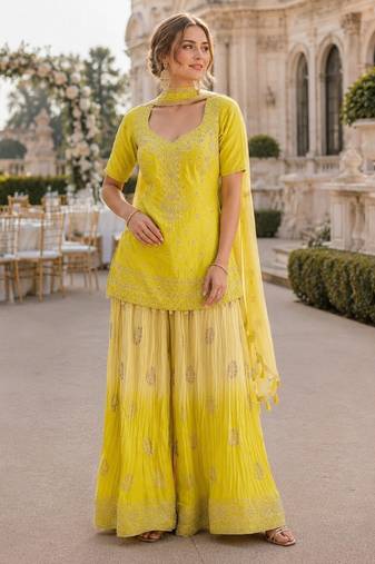 Yellow chinon free size stitched suit with embroidery work