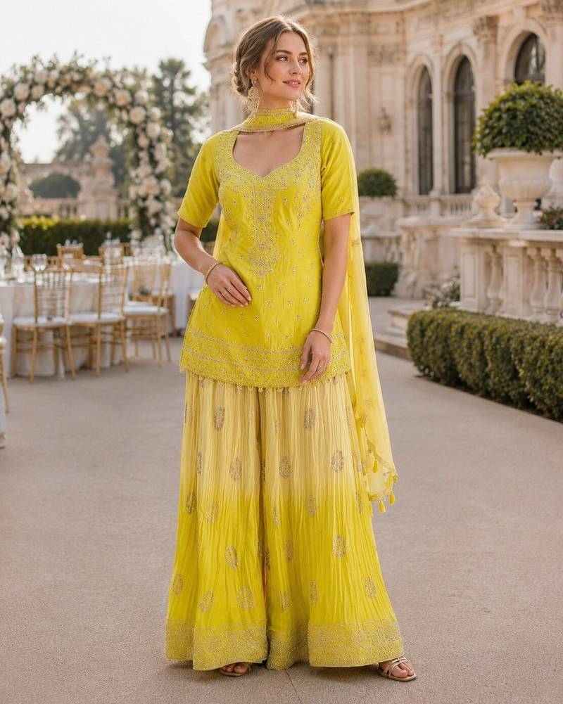 Yellow chinon free size stitched suit with embroidery work