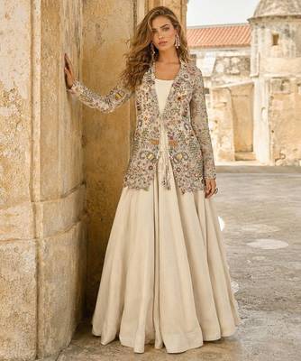 Off white silk free size stitched suit with embroidery work 1