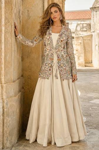Off white silk free size stitched suit with embroidery work