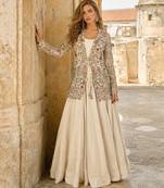 Off white silk free size stitched suit with embroidery work