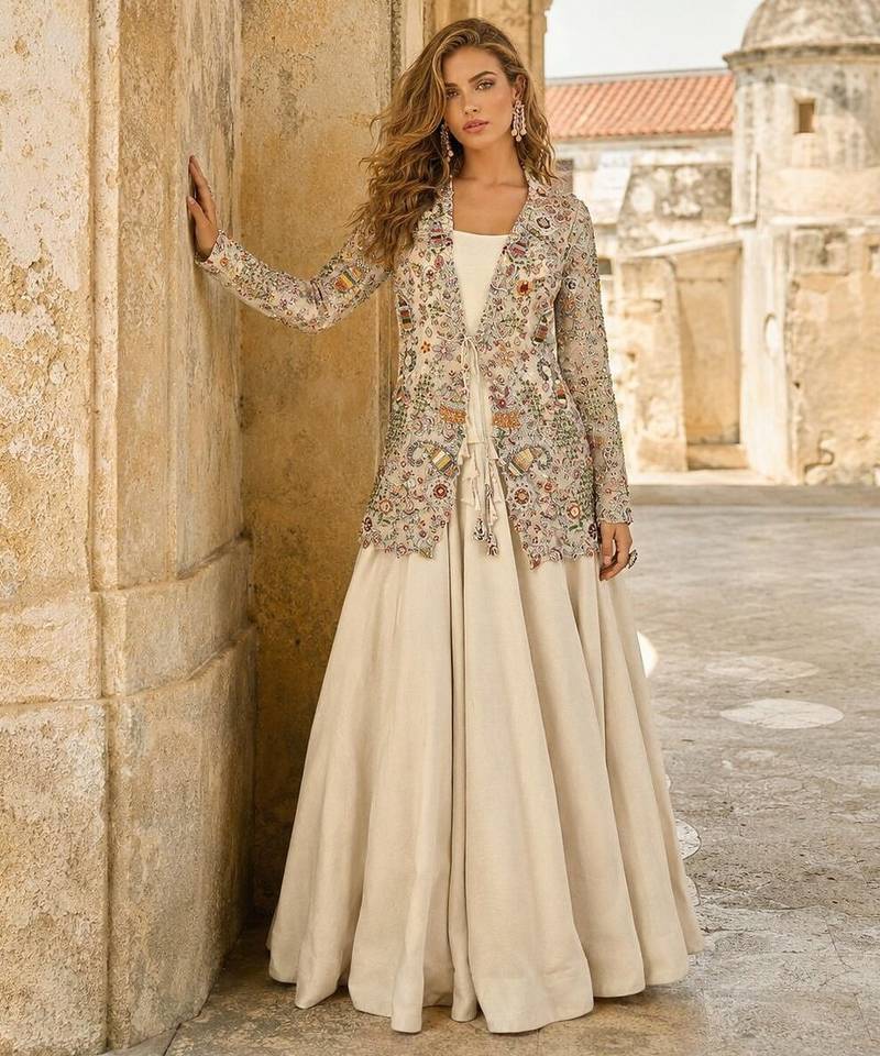 Off white silk free size stitched suit with embroidery work