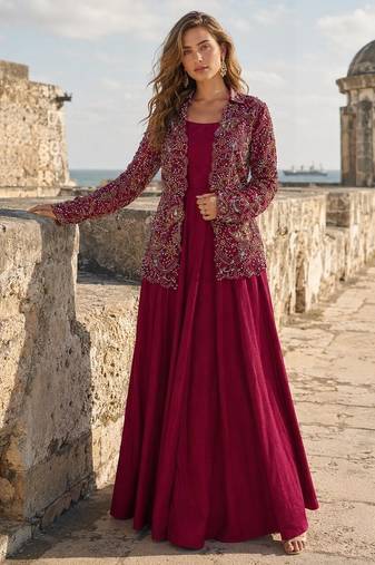 Maroon silk free size stitched suit with embroidery work