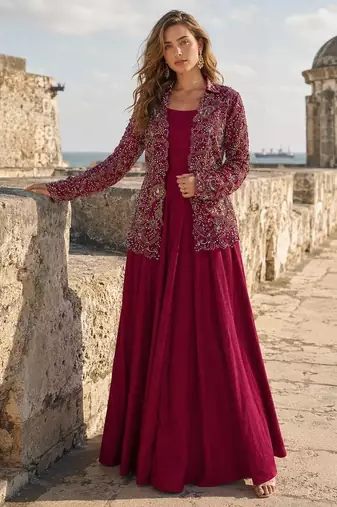 Maroon silk free size stitched suit with embroidery work