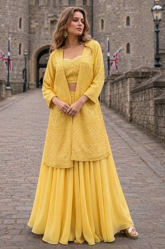 Yellow georgette free size stitched suit with embroidery & beats work