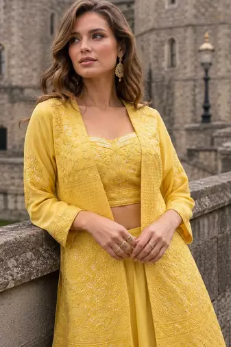 Yellow georgette free size stitched suit with embroidery & beats work