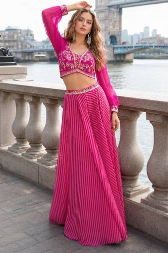 Pink silk free size stitched suit with embroidery work
