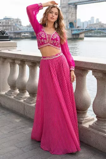 Pink silk free size stitched suit with embroidery work