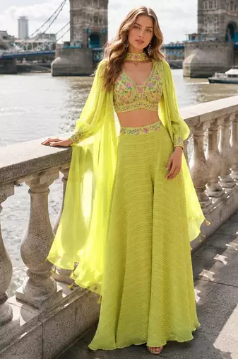 Green silk free size stitched suit with embroidery work