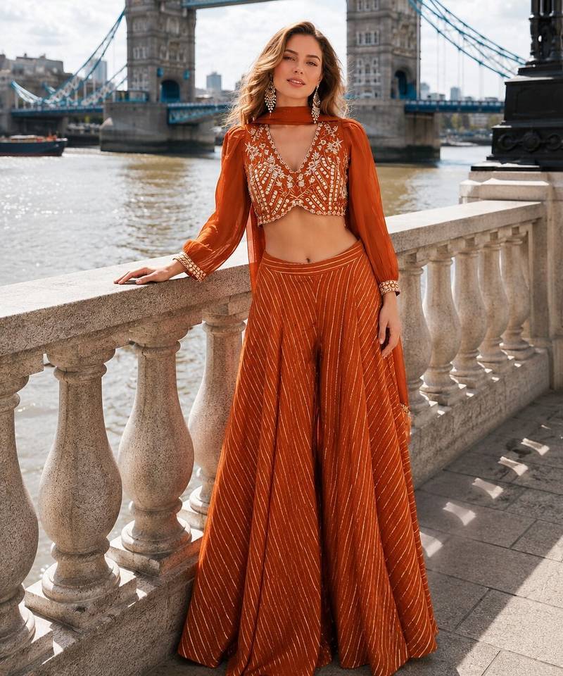 Orange silk free size stitched suit with embroidery work