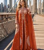 Orange silk free size stitched suit with embroidery work