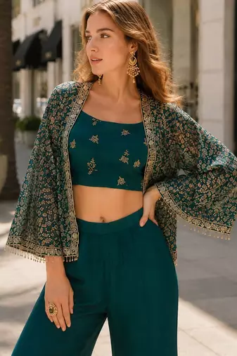Teal green silk free size stitched suit with embroidery work