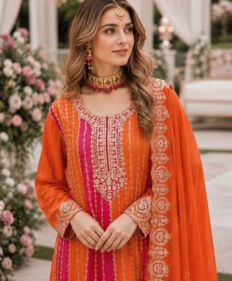 Orange chinon free size stitched suit with embroidery work 2