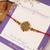 Golden bead cluster traditional rakhi with roli chawal capsules
